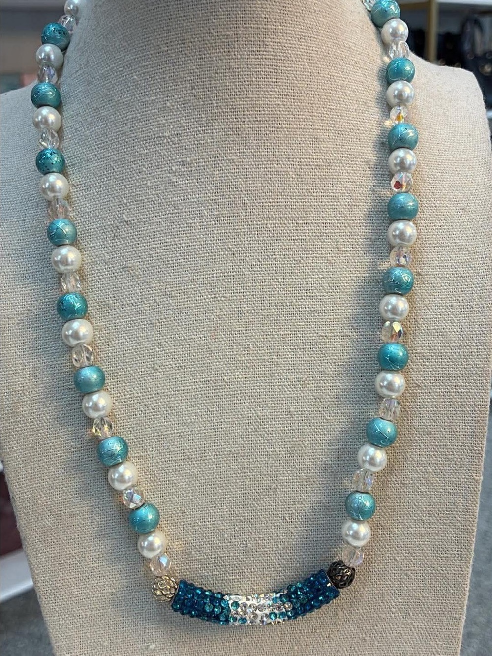 Blue beaded necklace with glass